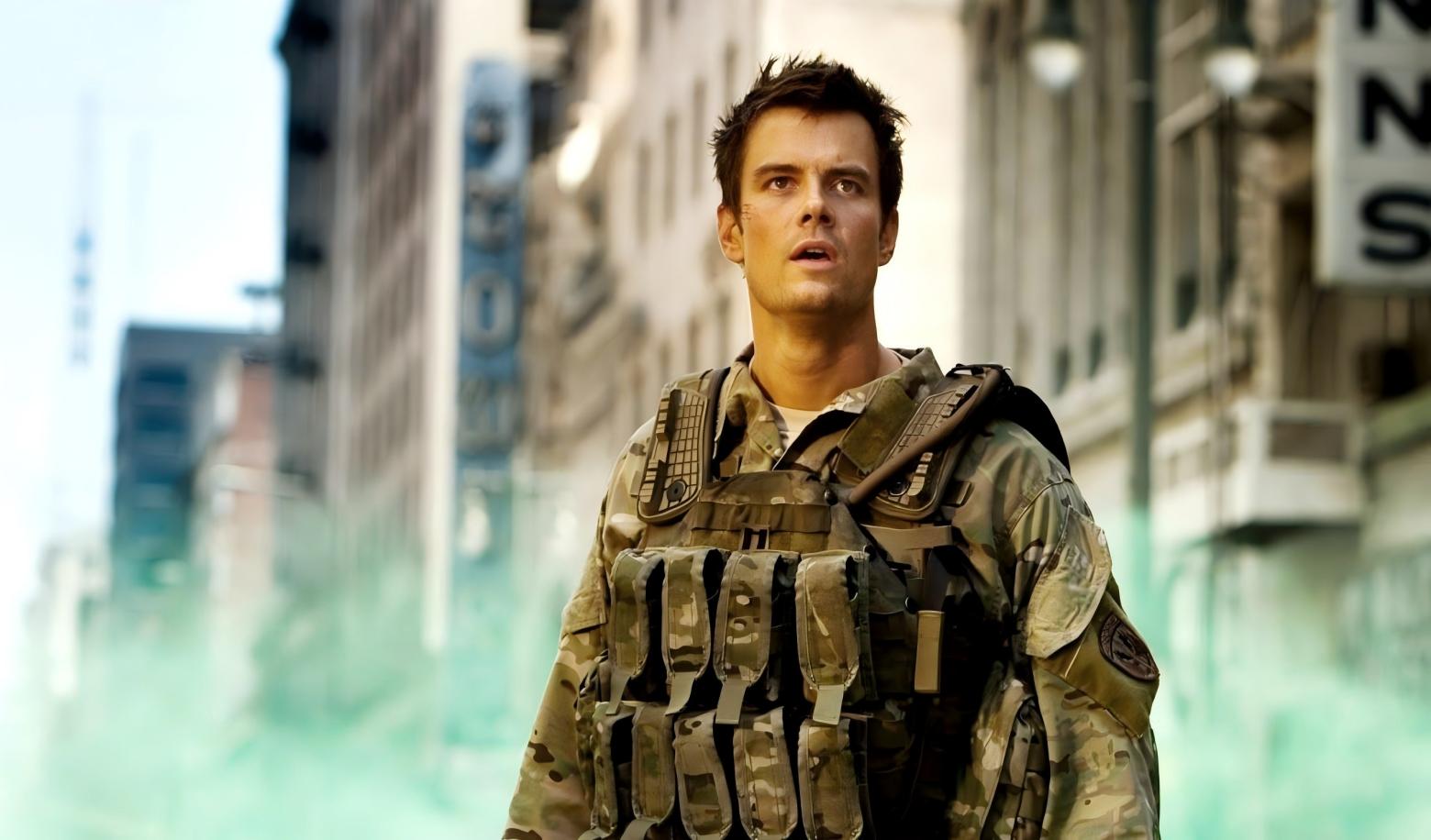 Who are the human military leaders assisting the Autobots?